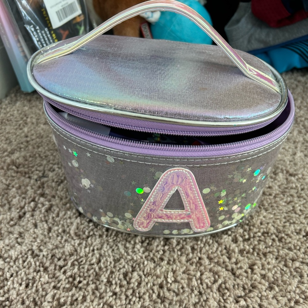 Justice purple makeup bag